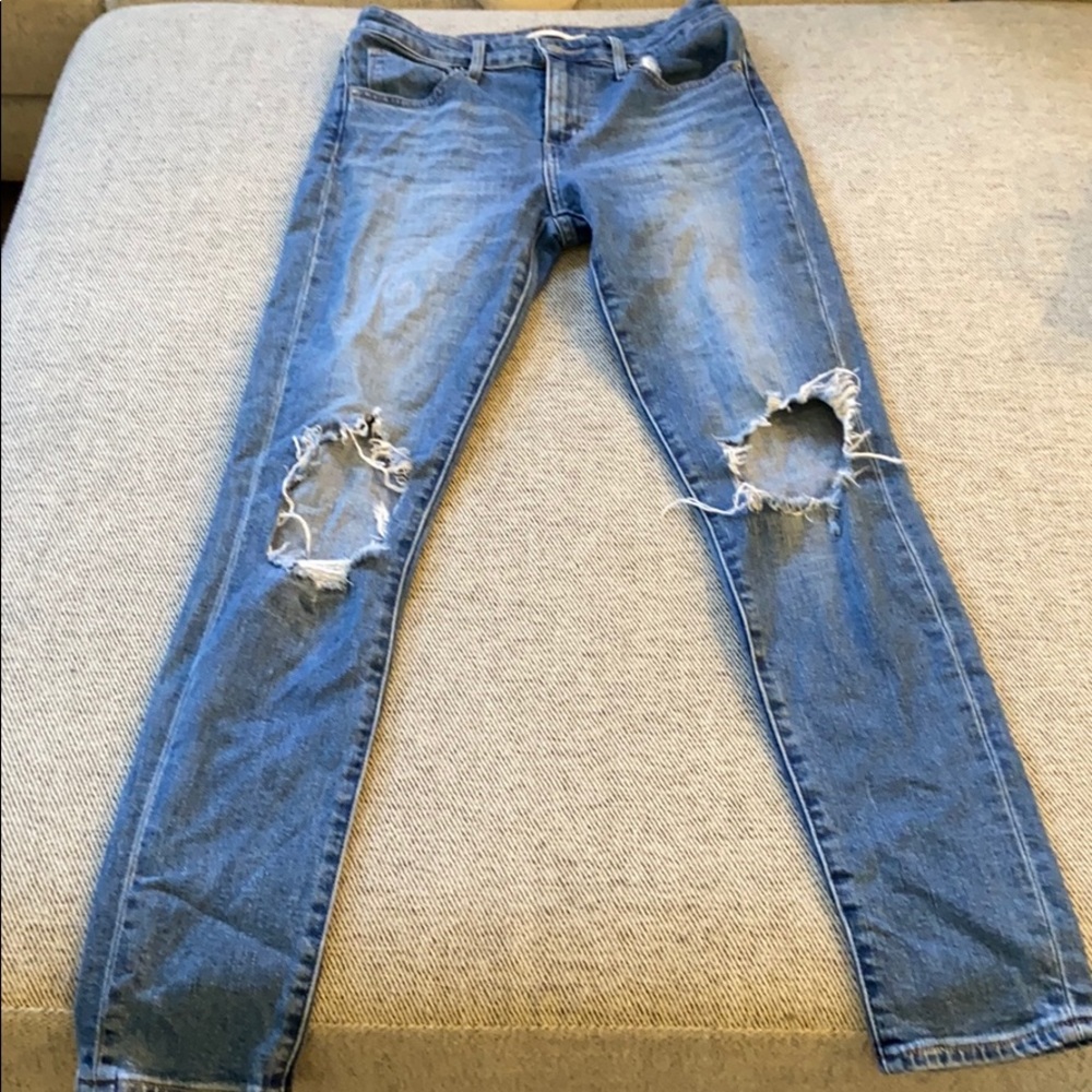 Levi’s 721 High Rise Skinny Distressed Knees